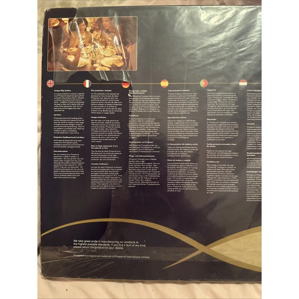 set of four Pimpernel placemats featuring a stylized 